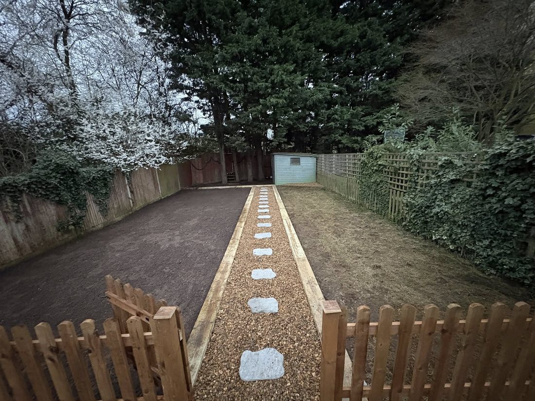 Same lawn cleared with new stepping-stone path
